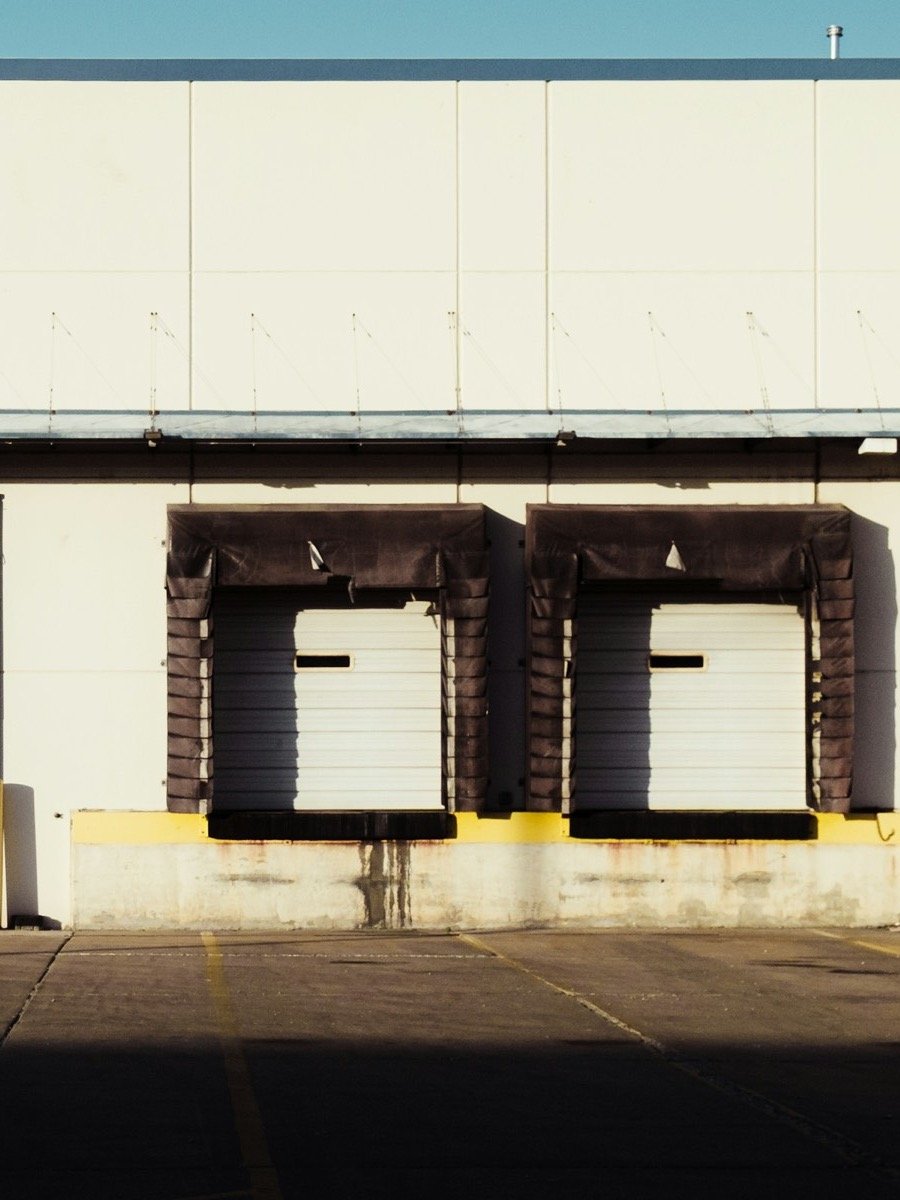 Two loading dock doors on a commercial building